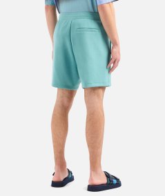 Shorts con patch logata laterale