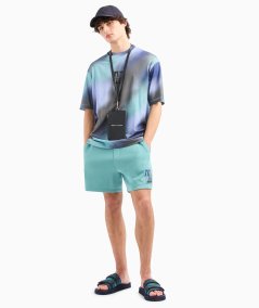 Shorts con patch logata laterale