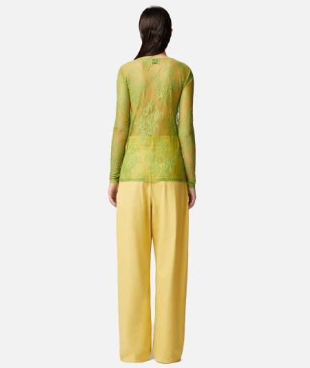Maglia aderente in pizzo con frange
