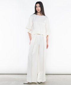 Blusa girocollo con maniche volant