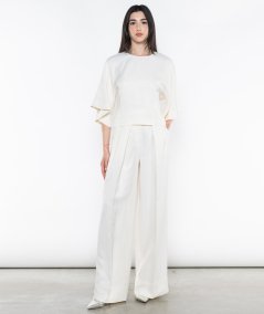 Blusa girocollo con maniche volant