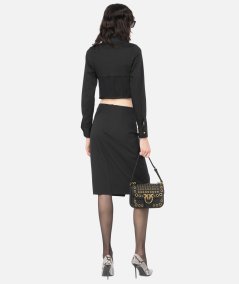 Midi skirt with piercing buckle