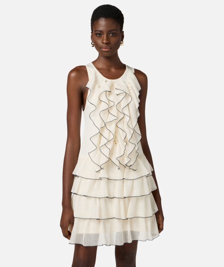 Knit dress with ruffles and flounces
