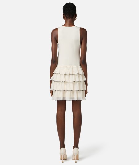 Knit dress with ruffles and flounces